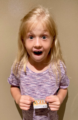 A’zalea holding a ticket used for the public restroom