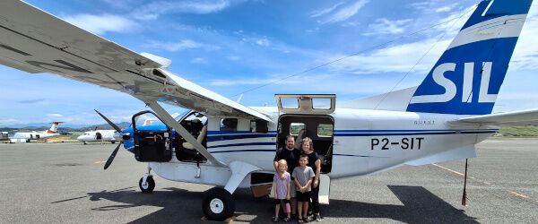 Bradleys in front of the SIL PNG Airplane