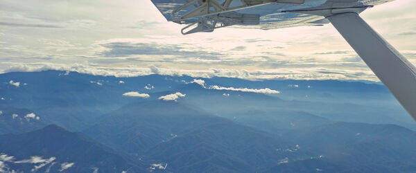 A view of the PNG Mountains from a small airplane