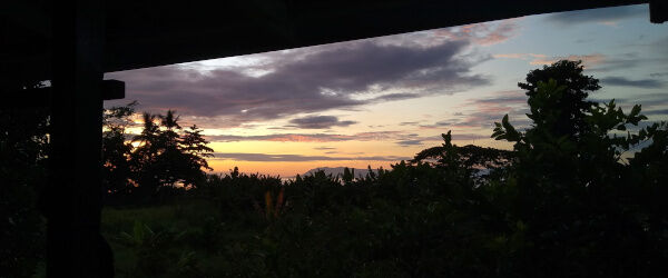 A beautiful sunest from the porch of our beach house in Alotau, PNG